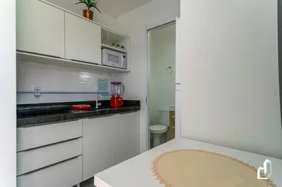 A cozinha ou kitchenette de Residencial Lynary – Loft Marte