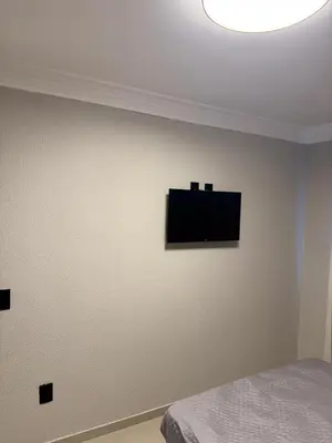 Uma televisão e/ou sistema de entretenimento em Apartamento 207 summer beach