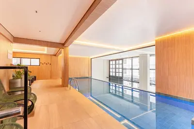 A piscina em ou perto de Elegante Suíte a 120m do Praia de Bombinhas