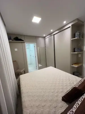Uma cama ou camas num quarto em Apartamento Luxo 3 suítes