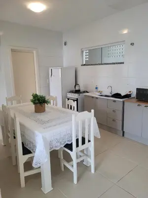 A cozinha ou kitchenette de Pousada Jardim