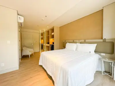 Uma cama ou camas num quarto em Suítes da Estadia Catarina no BLUE SEA HOTEL, beira-mar e lazer completo