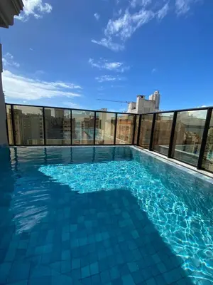 A piscina em ou perto de Apto Kairós Beach Stay - Piscina e Churrasqueira