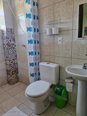 Uma casa de banho em Pousada Martanha