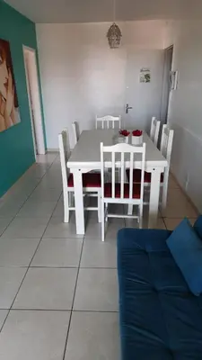 Uma área de estar em Apartamento com vista pro mar