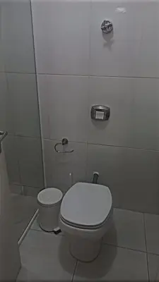 Uma casa de banho em Apartamento com vista pro mar