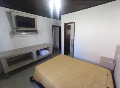 Uma cama ou camas num quarto em Casa com piscina na praia de Mariscal