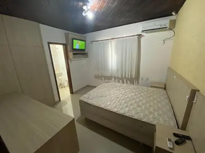 Uma cama ou camas num quarto em Casa com piscina na praia de Mariscal