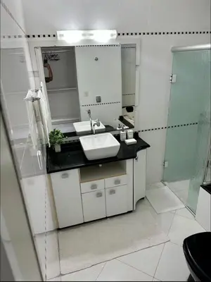 Uma casa de banho em Casa Aconchegante com piscina