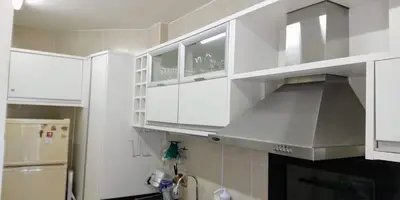 A cozinha ou kitchenette de Prédio frente mar apto frente p montanhas a 20m PRAIA 8 pessoas