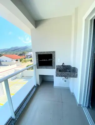 Uma varanda ou terraço em Apartamento Bosque das Oliveiras - Palmas