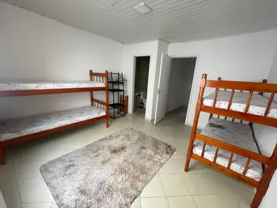 Uma cama ou camas num quarto em Casa 2 suítes