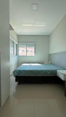 Uma cama ou camas num quarto em Apto Confortável e Impecável