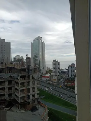 Uma vista geral de Itapema ou a vista da cidade a partir do apartamento