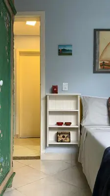 Uma cama ou camas num quarto em Bromélia 106