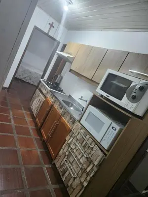 A cozinha ou kitchenette de House in Itapema half beach