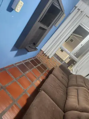 Uma área de estar em House in Itapema half beach