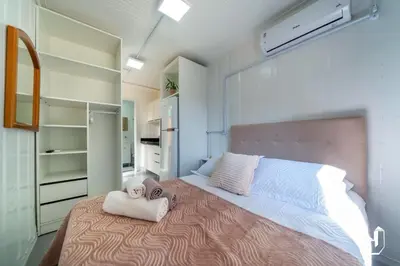 Uma cama ou camas num quarto em Residencial Lynary – Loft Terra