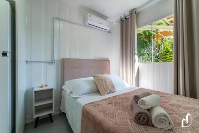 Uma cama ou camas num quarto em Residencial Lynary – Loft Terra