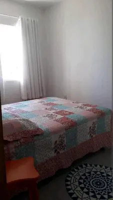 Uma cama ou camas num quarto em Apê Charmoso a Passos do Mar Aproveite Itapema!