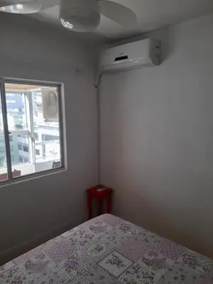 Uma cama ou camas num quarto em Apê Charmoso a Passos do Mar Aproveite Itapema!