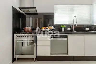 A cozinha ou kitchenette de Refúgio Marítimo na praia - Balneário Camboriú