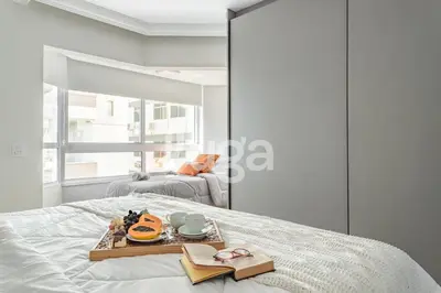Uma cama ou camas num quarto em Refúgio Marítimo na praia - Balneário Camboriú