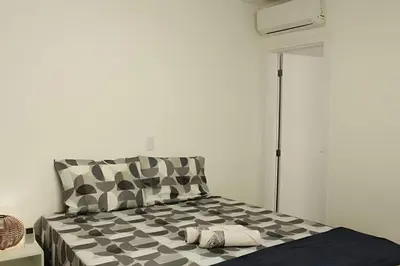 Uma cama ou camas num quarto em 3 Quartos com A/C | 2 Vagas | 500m da Praia
