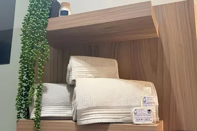 Uma cama ou camas num quarto em Porto Industrial: A/C | Vaga | Praia a 400m