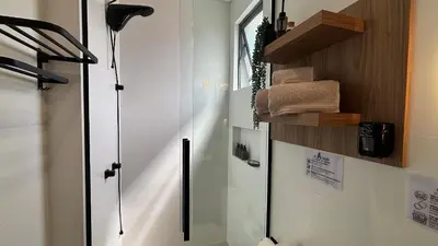 A cozinha ou kitchenette de Porto Industrial: A/C | Vaga | Praia a 400m