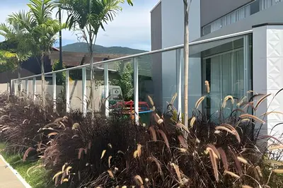 Um jardim no exterior de Apto Térreo com Garden | A/C e Churrasqueira