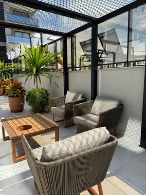 Uma varanda ou terraço em Palmas - Apto de praia moderno em HomeClub a 550m do mar