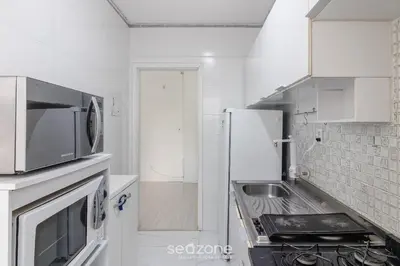 A cozinha ou kitchenette de Apto completo 2Q a 80m da Praia em BC IDI0306