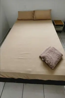 Uma cama ou camas num quarto em Ap 34 in Barra with access to the best beaches in BC