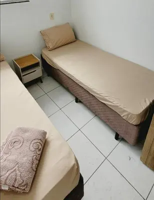 Uma cama ou camas num quarto em Ap 34 in Barra with access to the best beaches in BC