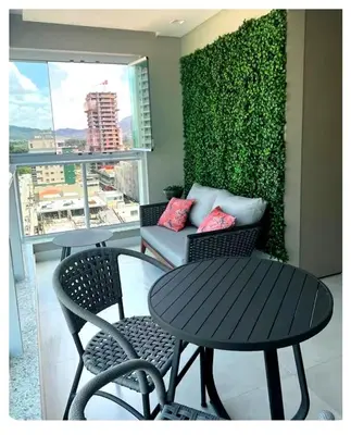 Uma área de estar em Apartamento com Varanda Gourmet a 400 m Meia Praia