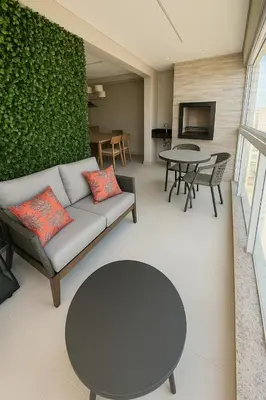 Uma área de estar em Apartamento com Varanda Gourmet a 400 m Meia Praia