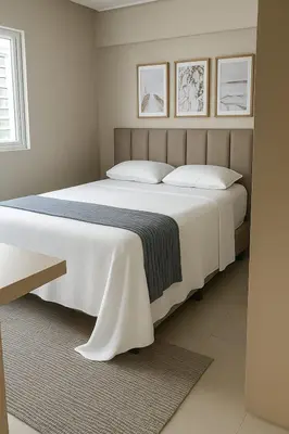 Uma cama ou camas num quarto em Apartamento com Varanda Gourmet a 400 m Meia Praia