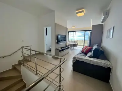 Uma televisão e/ou sistema de entretenimento em Cobertura Partenon 203