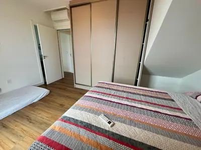 Uma cama ou camas num quarto em Cobertura Partenon 203