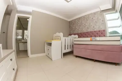 Uma cama ou camas num quarto em Casa deslumbrante, com vista para o mar