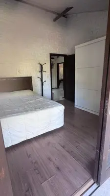 Uma cama ou camas num quarto em Sítio Recanto das Águas
