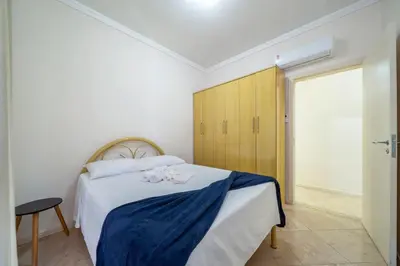 Uma cama ou camas num quarto em Cobertura c\\ vista para o mar em Itapema CV6489