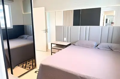 Uma cama ou camas num quarto em ASA | Cobertura Duplex | Meia Praia | Hidro | 4QT