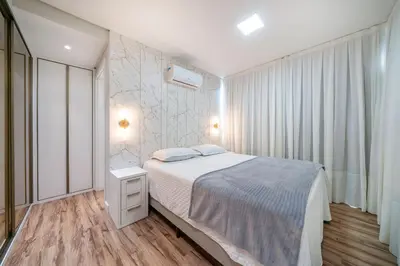 Uma cama ou camas num quarto em Splendour 201 - Cobertura duplex à 200 metros da Praia do Mariscal