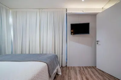 Uma cama ou camas num quarto em Splendour 201 - Cobertura duplex à 200 metros da Praia do Mariscal