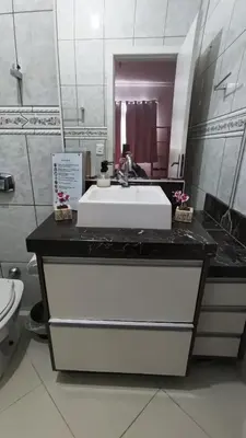 Uma casa de banho em Suíte Master, Ar cond, Tela Cinema 150