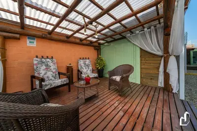 Uma área de estar em Residencial Lynary – Loft Vênus