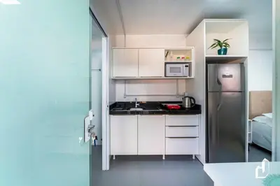A cozinha ou kitchenette de Residencial Lynary – Loft Vênus