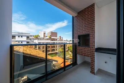Uma varanda ou terraço em 310 Flat Moderno e Bem Localizado a 120 metros da praia de Bombinhas Até 4 Pessoas